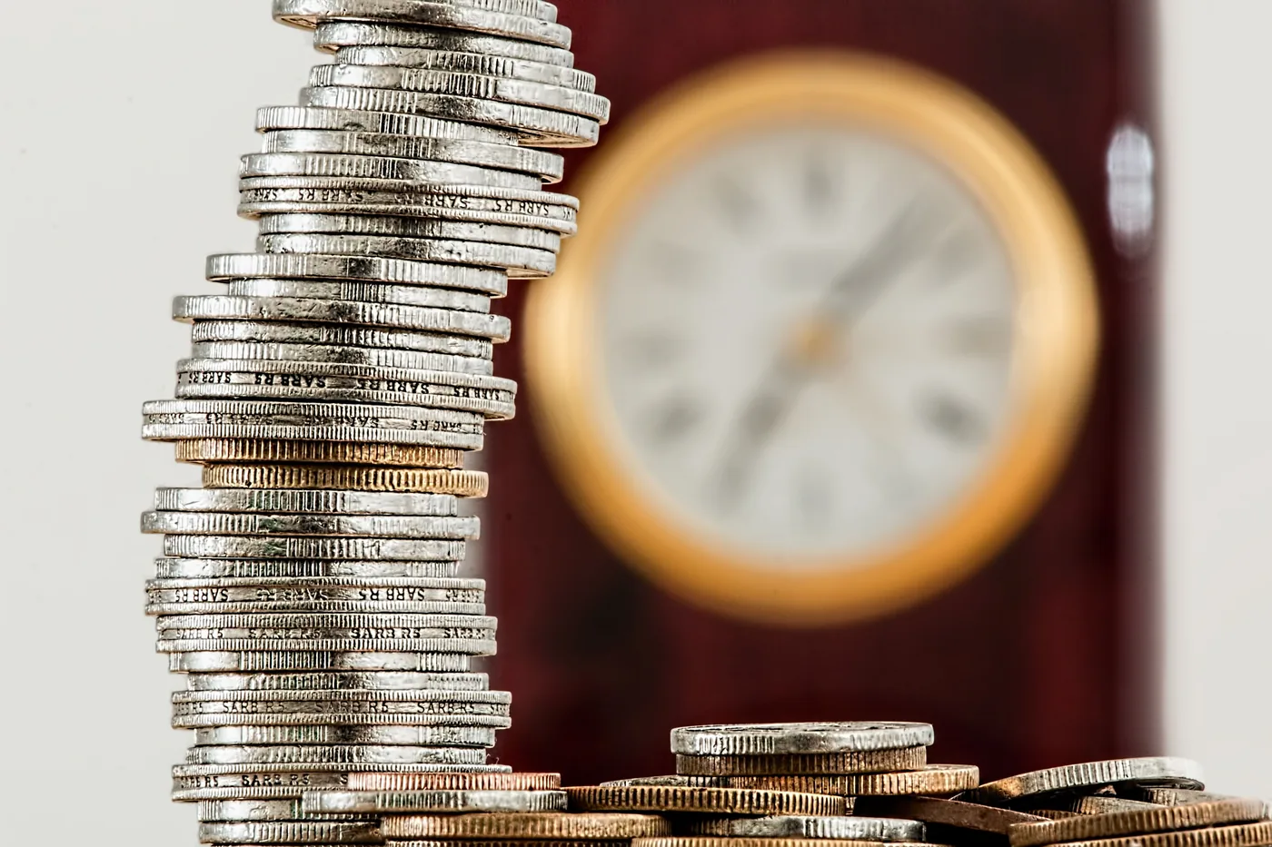 Stacked coins representing cost per lead