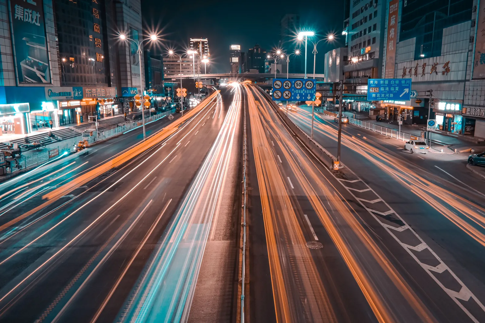 Light trails on a city highway at night, representing the routes that drive traffic to content in 2026