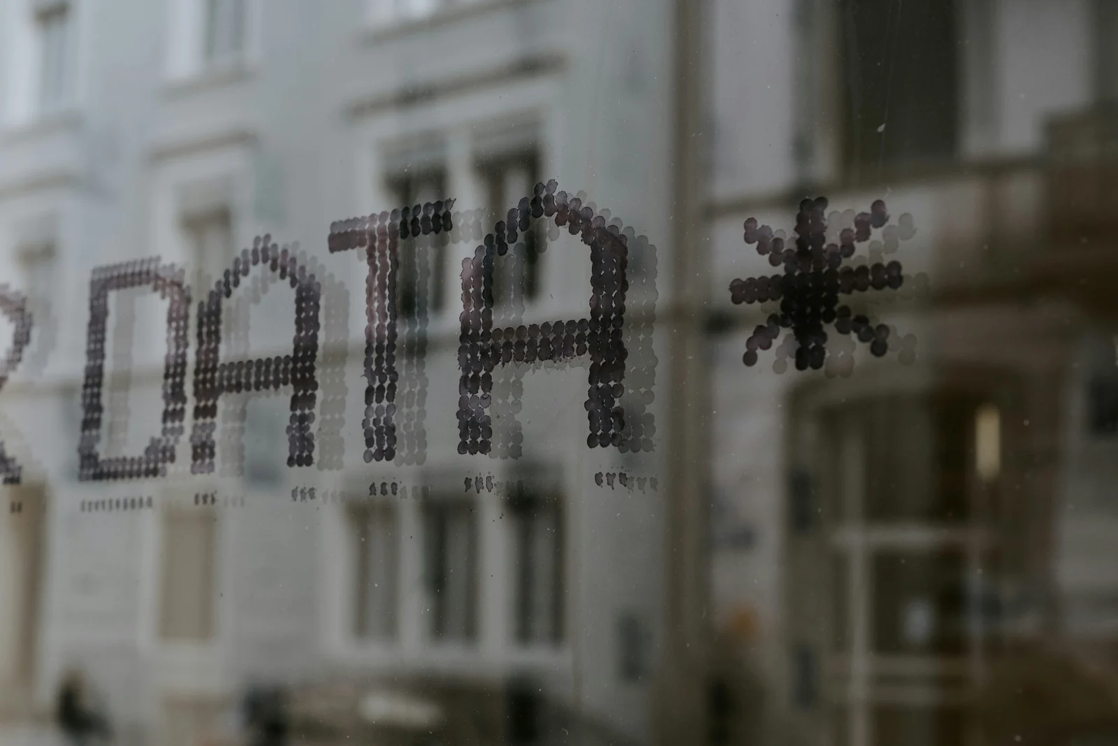 The word data traced in condensation on glass, first-party data made visible