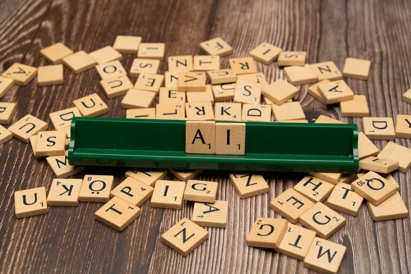 Scrabble tiles spelling AI representing generative engine optimization