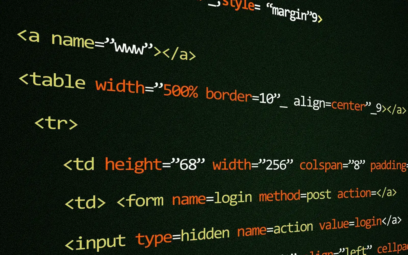 HTML source code on a dark screen, representing vibe coding for beginners