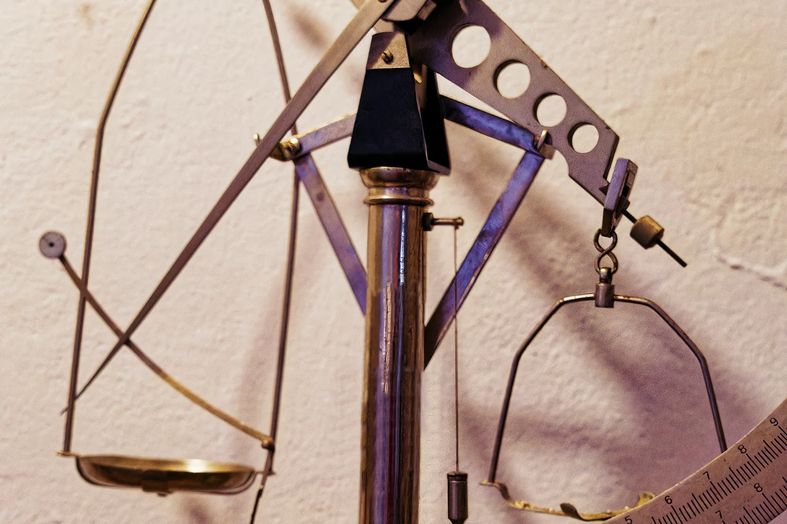 An antique balance scale weighing credit the way attribution models do