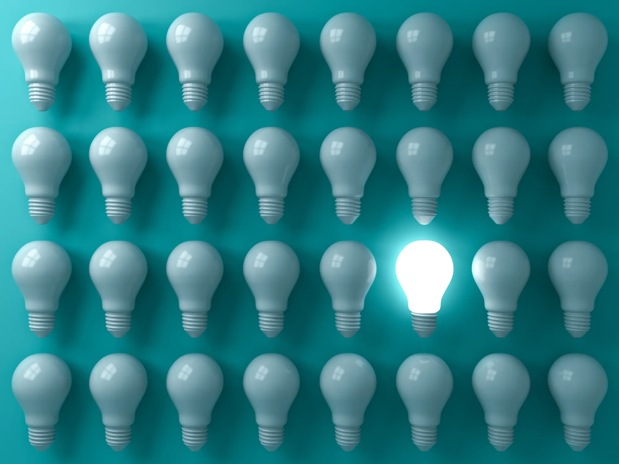 One lit bulb in a grid of unlit bulbs: a digital advertising and marketing agency built for the AI era